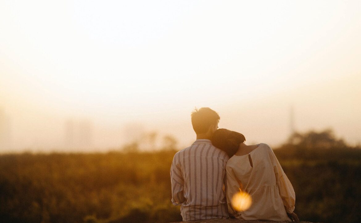 man-and-woman-near-grass-field-1415131