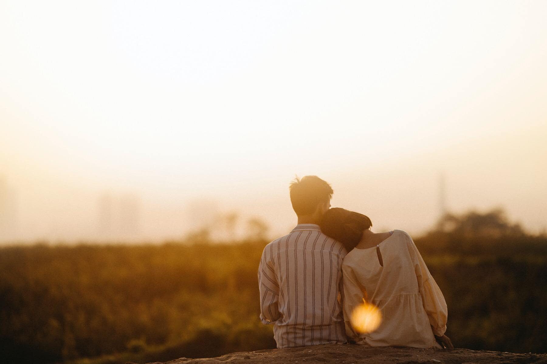 man-and-woman-near-grass-field-1415131